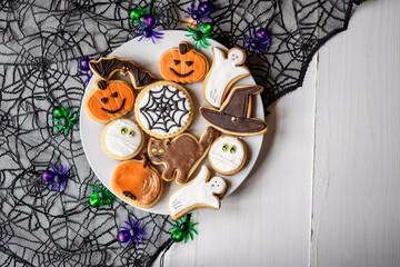 halloween dessert sweet baked trick or treat cookies, cake, bisquits shaped pumpkin, ghost, with,  - 541071809