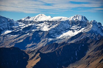 View of the glarus alps. Piz Segnas and Piz Sardona. Snow cover from the first snow, hiking in the autumn time. High quality photo