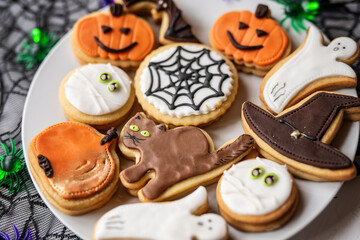 halloween dessert sweet baked trick or treat cookies, cake, bisquits shaped pumpkin, ghost, with,  - 541072068