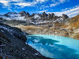 Wildsee, Mountain lake in the pizol. lake hike in autumn. Wanderlust in the Swiss Alps. fantastic mountain panorama. High quality photo