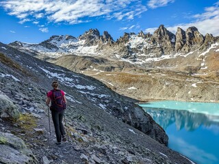 Fototapeta premium Wildsee, Mountain lake in the pizol. lake hike in autumn. Wanderlust in the Swiss Alps. fantastic mountain panorama. High quality photo