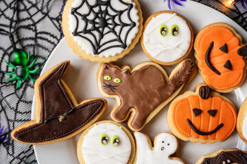 halloween dessert sweet baked trick or treat cookies, cake, bisquits shaped pumpkin, ghost, with,  - 541073821