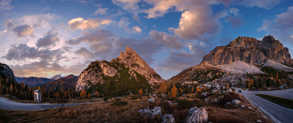 Early morning autumn alpine Dolomites mountain scene. Falzarego Pass, Italy