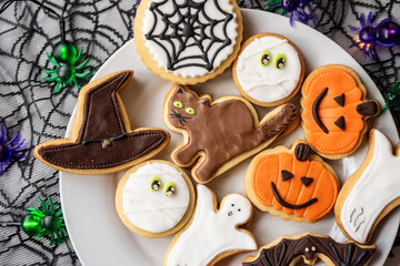 halloween dessert sweet baked trick or treat cookies, cake, bisquits shaped pumpkin, ghost, with,  - 541075217