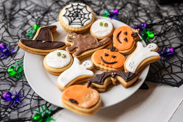 halloween dessert sweet baked trick or treat cookies, cake, bisquits shaped pumpkin, ghost, with,  - 541076034