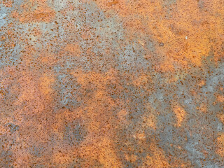 Rusty old iron red scratched metal corrosed sheet surface background, texture industrial in loft style