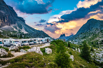 Beautiful sunset mountain scenery at Rifugio Passo Valparola at camper parking area. Falzarego...