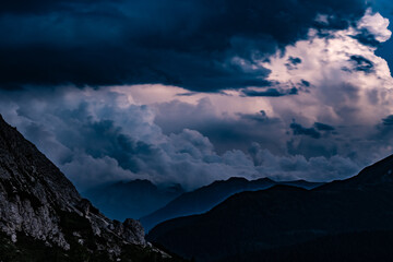 Obraz premium Late evening thunderstorm over Marmolada observed from Falzarego pass camper parking area. Falzarego pass, Dolomites, South Tirol, Italy, Europe.