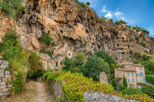 Travel destination, small old village in hear of Provence Cotignac with famous cliffs with cave dwellings and troglodytes houses, Var, Provence Alpes Cote D'Azur, France