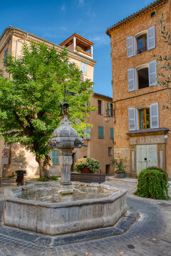 Travel destination, small old village in hear of Provence Cotignac with famous cliffs with cave dwellings and troglodytes houses, Var, Provence Alpes Cote D'Azur, France