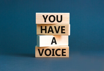 You have a voice symbol. Concept words You have a voice on wooden blocks. Beautiful grey table grey...