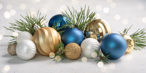 Christmas or New Year holidays decoration. Christmas colorful baubles and fir branches. Winter holiday greeting card.