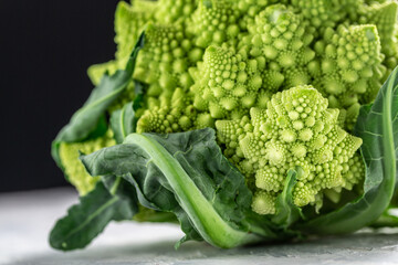 Romanesco broccoli close up. The fractal vegetable is known for it's connection to the fibonacci...