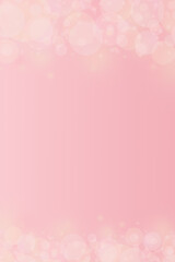 pastel pink background with blur bokeh lights and free space for text