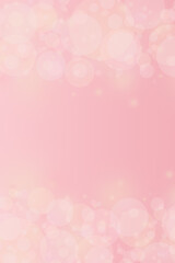 pastel pink background with blur bokeh lights and free space for text