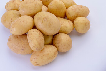 Potatoes close-up isolated on white background. Studio photo.