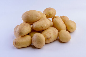 Potatoes close-up isolated on white background. Studio photo.