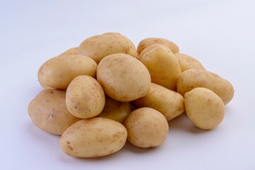 Potatoes close-up isolated on white background. Studio photo.