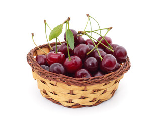 Red ripe cherries in the basket.