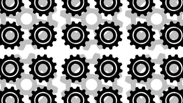 Animated video of several gears in a row on a white and green background. Clockwise and counterclockwise rotation
