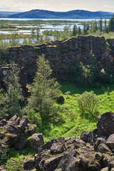 Rock walls of Almannagja Fault in Thingvellir National Park, Iceland on a clear summer day.