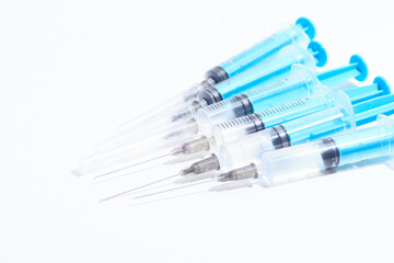 Disposable plastic syringe prepared for injection and vaccination in the hospital. The concept of medicine and health