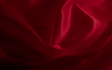 Abstract red maroon satin textile textures,shiny and smooth abstract background. Ideal as advertising, wallpaper,brochure etc., 