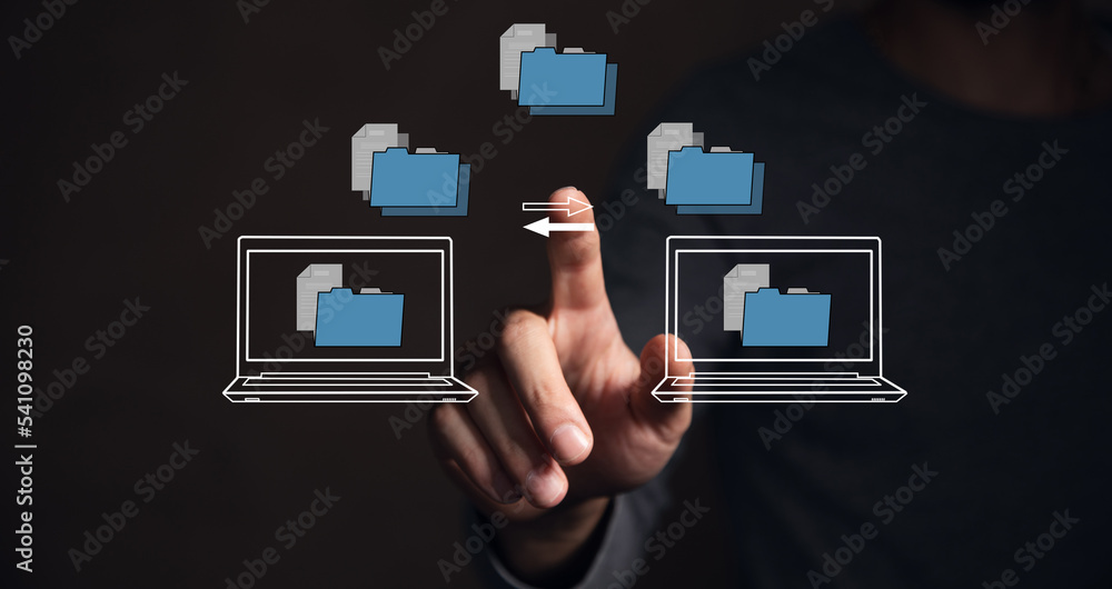 Poster transferring files between laptops on a virtual screen.