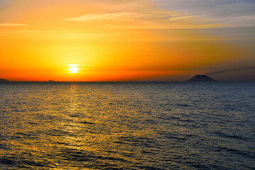 sunset of the volcano Stromboli seen from capo vaticano italy