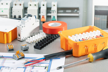 Set of electrician tools and equipments on desk with scheme, flat lay. repair, check electrical...