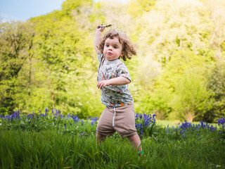 Fototapeta premium little child running in the field