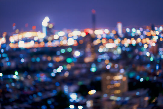 Abstract Lighting bokeh background with cityscape view on rooftop place , Background or backdroup use.