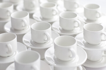 Espresso cups with saucers stacked on top of each other