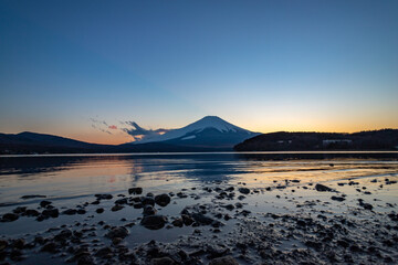 Fuji mountain and White swan in Yamanaka Lake, Japan