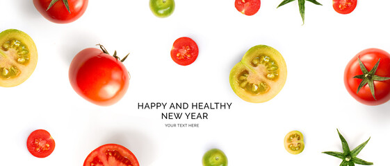 Creative happy and healthy new year card made of tomatoes on the white background. tomatoes happy...
