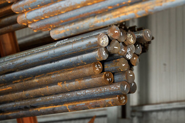 Round steel section rolling profile with marking in storage