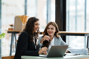 Woman working on the computer in the office