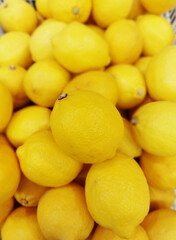 Lemon on vegetable shelf in store Farmer's Market Organic.