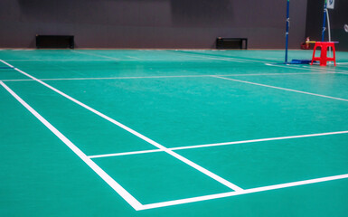 Fototapeta na wymiar Empty green badminton court for playing