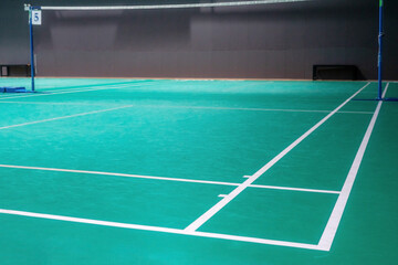 Empty green badminton court for playing