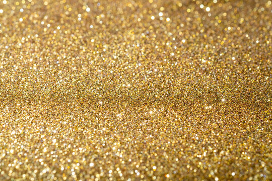 metal gold dust sand glitter abstract background texture Luxury and elegant decoration