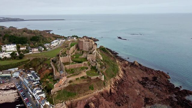 Beautiful aerial drone footage view of Mont Orgueil Castle on the cliff