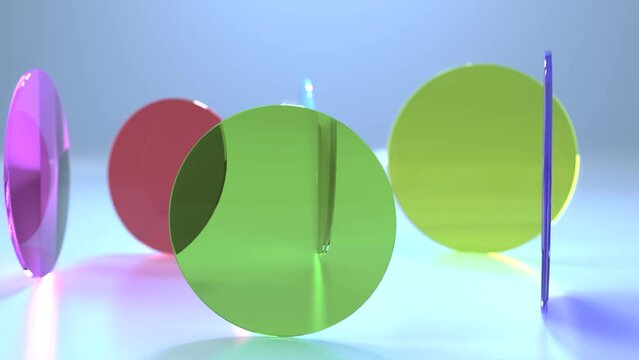 Colorful colored lenses rotate on a blue background. 3d animation
