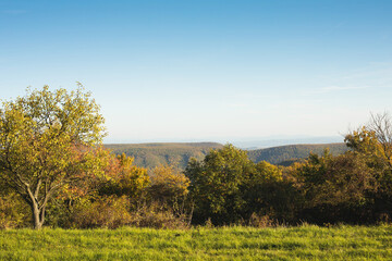 Hilly rural landscape in autumn season.