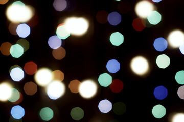 multicolored festive lights on a black background screensaver backdrop