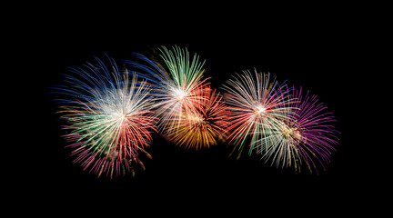 Fireworks sparkling on night sky celebration.