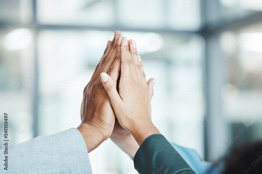 Poster hands, high five and motivation with a team working in collaboration together in the office. team bu