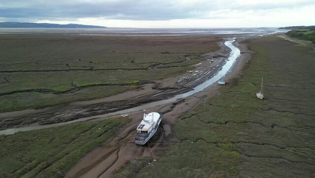 Sarinda, Harbour Defence Launch used in D-Day Landings - mid restoration, Heswall. Aerial drone anti-clock wise pan and move close from afte to fore - 23rd October 2022