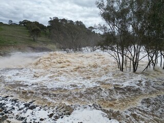 Lake Eppalock dam spillway overflowing into the Campaspe River near Bendigo after heavy spring rain...