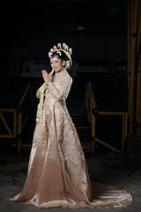 Beautiful model, wearing makeup and Javanese Indonesian wedding dress.